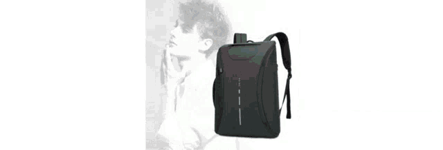 a man carrying a green duffel bag with the words new duffel bags below him