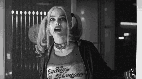 a black and white photo of harley quinn from suicide squad .