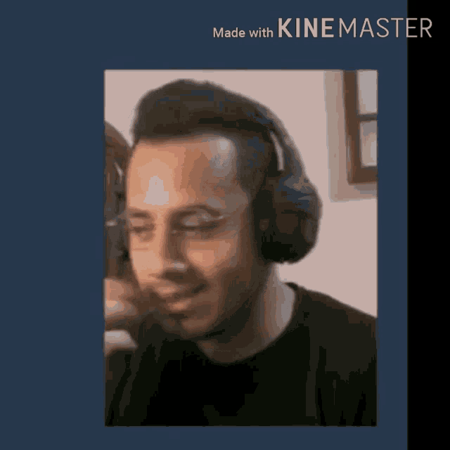 a man wearing headphones and glasses is making a funny face .