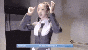 a woman in a maid costume is standing in a bathroom