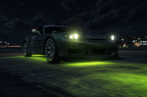 a green sports car with a nissan logo on the front