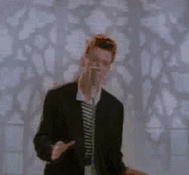 a blurry picture of a man in a suit