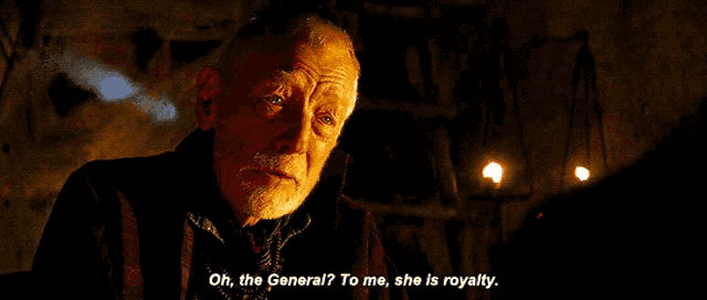 a man with a beard says oh the general to me she is royalty in a dark room