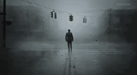 a man walking through a foggy street with konami on the bottom right