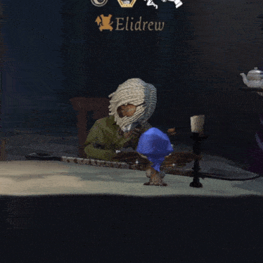 a person sitting at a table in front of a sign that says ' elidrew '