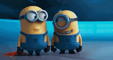 two minions are standing next to each other and holding hands