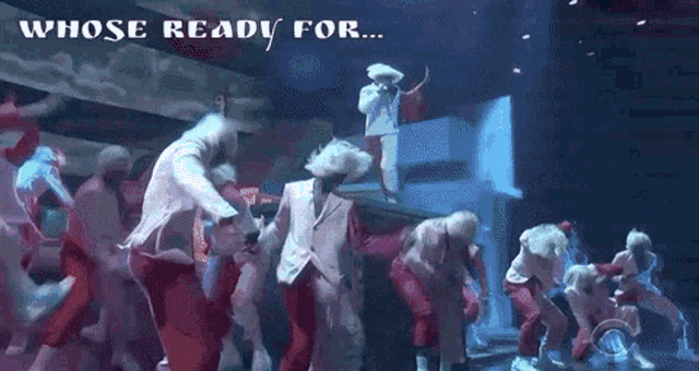a group of people dancing on a stage with the words whose ready for