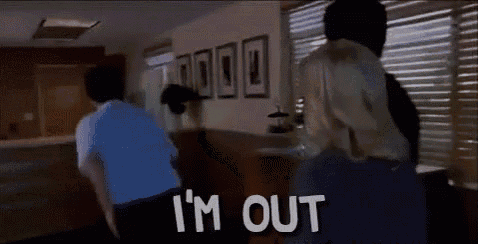 a man in a blue shirt says i 'm out in a room