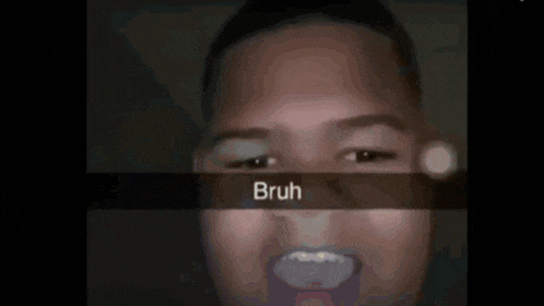 a close up of a person 's face with the word bruh written on the bottom .