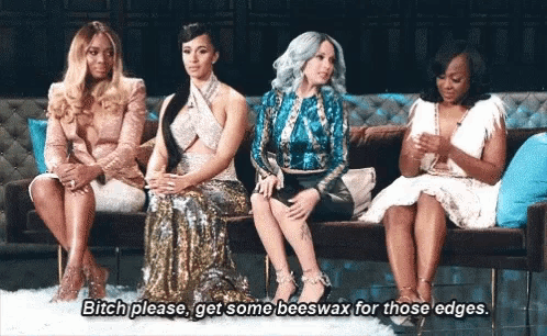 four women are sitting on a couch and one of them says bitch please get some beeswax for those edges .