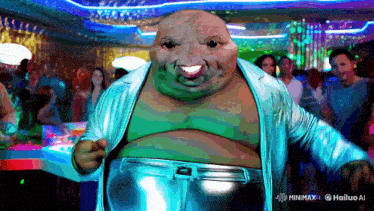 a fat man in a blue jacket and silver pants is dancing