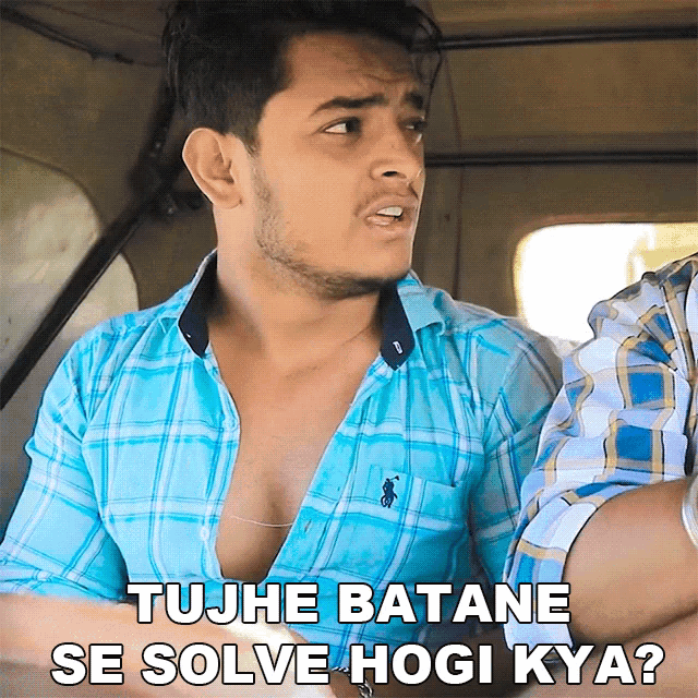 a man in a blue plaid shirt with the words tujhe batane se solve hogi kya