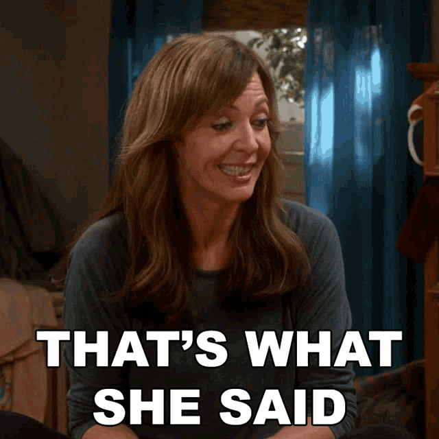a woman says that 's what she said in front of a blue curtain