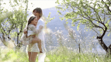 Mother And Daughter Carrying GIF - Mother And Daughter Carrying Playing GIFs