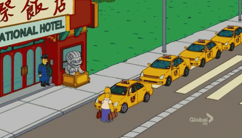 homer simpson is standing in front of a row of taxi cabs outside a hotel