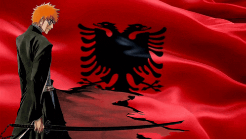 a man is holding a sword in front of a flag