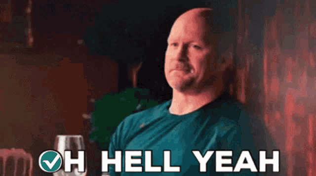 a bald man is holding a glass of wine and says oh hell yeah .