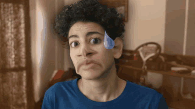 a person with a tear on their forehead looks surprised