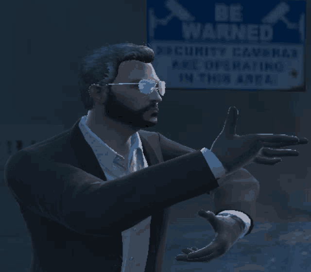 a man in a suit stands in front of a sign that says " be warned "