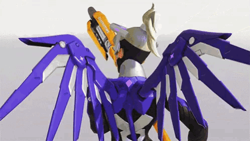 a purple and orange robot with the word guardians on the back of it