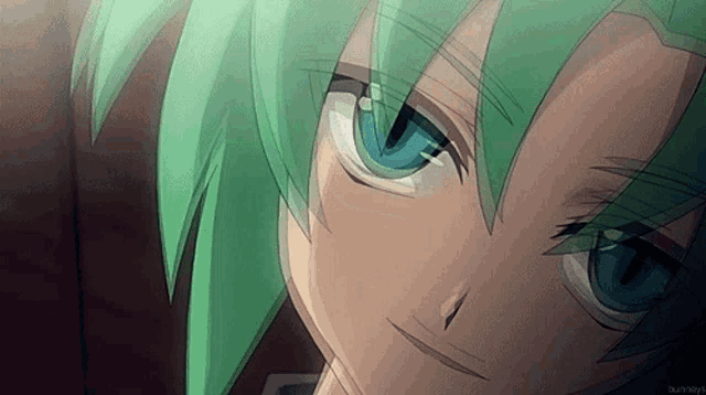 a close up of a girl with green hair and blue eyes .