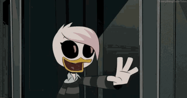 a cartoon character is standing in front of a fence and giving a fist .