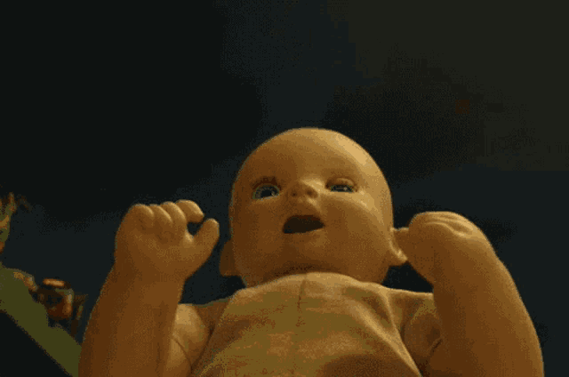 a doll with a surprised look on his face