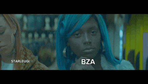 a woman with blue hair has the word bza written on her face