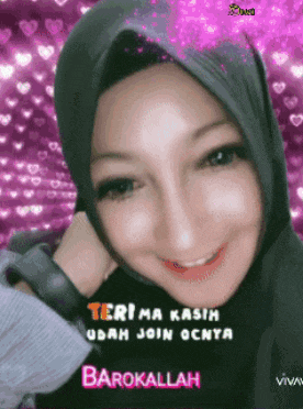 a picture of a woman wearing a hijab with the words terima kasih