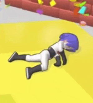 a cartoon character is laying on a yellow surface .
