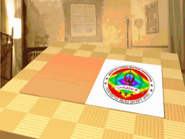 a piece of paper with a rainbow colored emblem on it