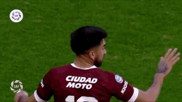 a soccer player with the number 10 on the back of his shirt