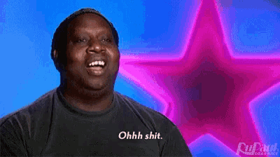 a man wearing a shirt that says ohh shit