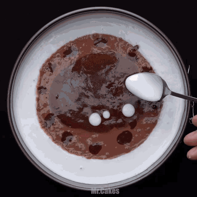 a bowl of food with the words mr.cakes on the bottom right