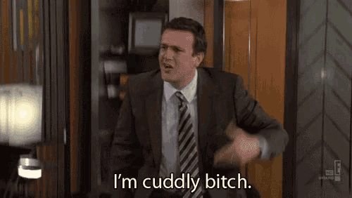a man in a suit and tie is saying `` i 'm cuddly bitch '' .