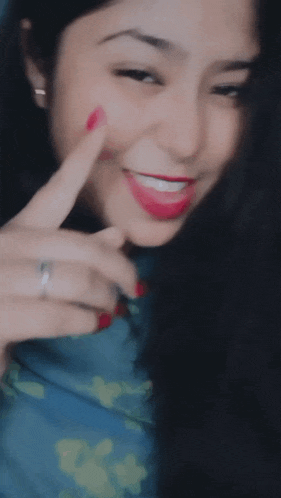 a close up of a woman 's face with her eyes closed