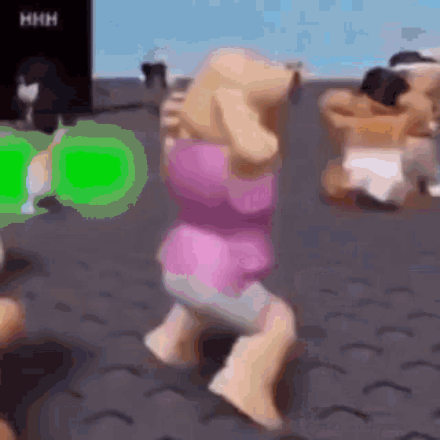 a doll is dancing in a video game with a green screen in the background .