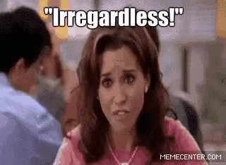 a woman in a pink shirt is sitting at a table with a man in the background and the words `` irregardless '' above her .