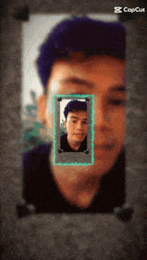 a picture of a man 's face is framed with a green border and the words capcut below it