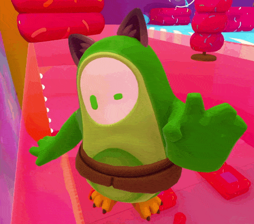 a green cartoon character with a cat 's ears on his head