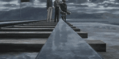 a man and a boy are standing next to each other in a black and white cartoon .