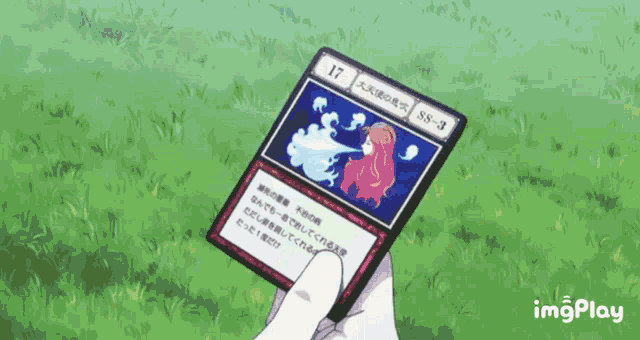 a person is holding a card that says ss-3 on it