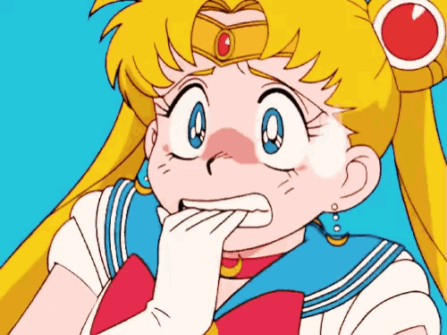 sailor moon is covering her mouth with her hand and making a surprised face .
