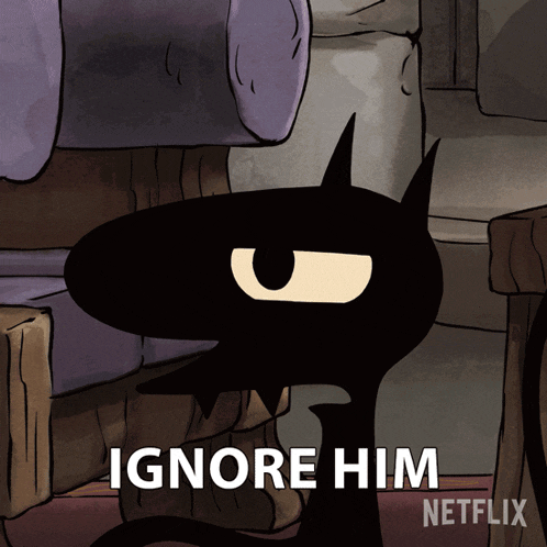 a cartoon of a cat with the words ignore him on the bottom