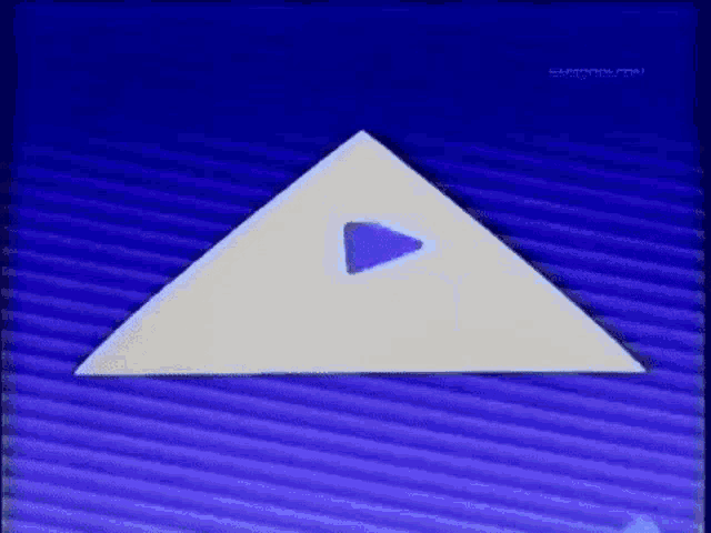 a white triangle with a blue play button in the middle is on a blue background .