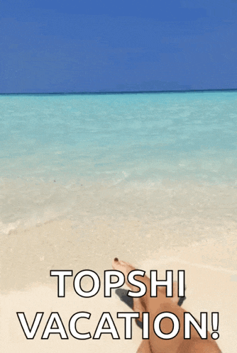 a person laying on a beach with the words topshi vacation written above them