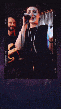 a poster for a music concert with a woman singing and a man playing guitar