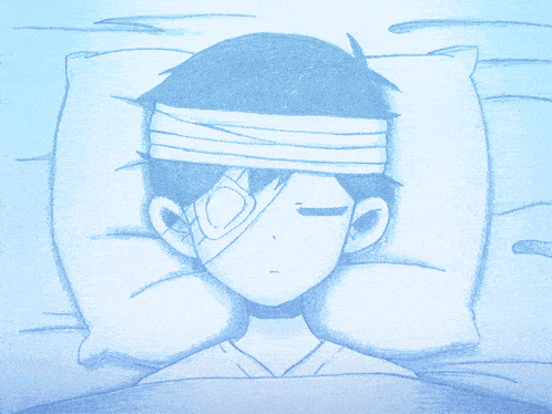 a boy with a bandage on his head is laying in bed