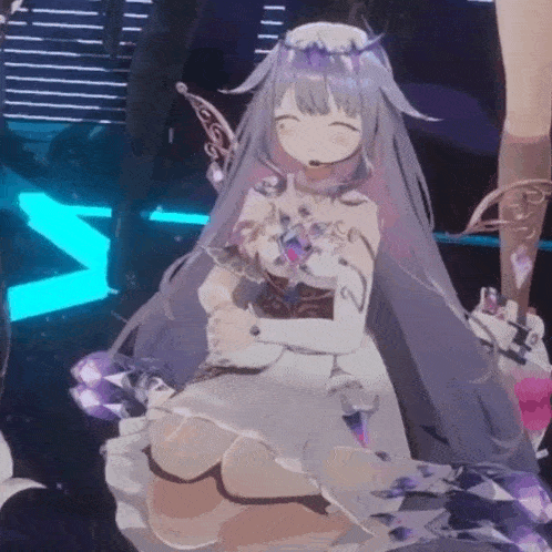 a girl in a white dress with purple hair is sitting on a stage .