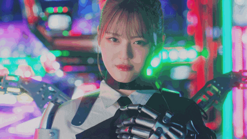 a woman with a robotic arm is standing in front of neon lights